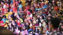 Sejumlah anak-anak mengenakan pakaian adat mengikuti Festival Prestasi Indonesia di JCC Senayan, Jakarta (21/8). Acara ini bertujuan untuk memberikan apresiasi atas karya-karya terbaik putra putri bangsa. (Liputan6.com/Johan Tallo)