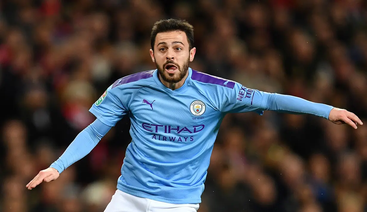 2. Bernardo Silva (Manchester City) - Bernardo Silva sejatinya adalah pemain sayap yang terampil di klub Monegasque. Pemain asal Portugal ini telah diubah menjadi gelandang tangguh oleh Pep Guardiola sehingga mampu meraih trofi Player of the Year klub. (AFP/Paul Ellis)