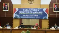 Konferensi pers perkembangan kasus virus corona baru yang memicu COVID-19 di Gedung Grahadi, Rabu (20/5/2020) (Foto: Liputan6.com/Dian Kurniawan)