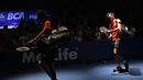 Tontowi Ahmad/Liliyana Natsir memasuki arena pertandingan BCA Indonesia Open 2015. (Peksi Cahyo/Bola.com)