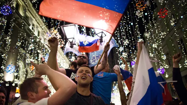 A fan of Russia shouts prior to the group A match between Russia and Egypt at the 2018 soccer World Cup in the St. Petersburg stadium in St. Petersburg, Russia, Tuesday, June 19, 2018.(AP Photo/Efrem Lukatsky)