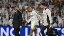Kalah agregat 1-5 (0-3 dan 1-2) memastikan Los Blancos tersingkir dari kompetisi Liga Champions 2024/2025. (JAVIER SORIANO/AFP)