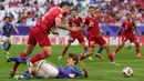 Hasil laga ini menempatkan Jepang sebagai runner up Grup D dan memastikan lolos ke babak 16 besar Piala Asia 2023 . (Giuseppe CACACE/AFP)