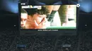 Pemain Tottenham Hotspur, Son Heung-min tampak tak mampu membendung air matanya dilihat dari layar stadion dalam laga persahabatan pramusim melawan Newcastle di Seoul World Cup Stadium, Seoul, Korea Selatan, Minggu (03/08/2025) waktu setempat. (AP Photo/Ahn Young-joon)