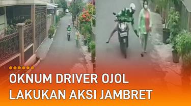 Sebuah rekaman CCTV menunjukkan aksi seorang oknum driver ojol lakukan penjambretan di pinggir jalan.