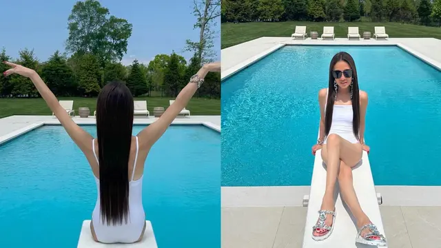 Desainer Vera Wang dalam pakaian renang one-piece berwarna putih.