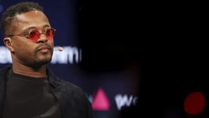 Pemain sepak bola profesional dan investor Prancis, Patrice Evra, memberikan wawancara di panggung utama Web Summit di Lisbon pada 14 November 2023. Acara teknologi terbesar di Eropa, Web Summit, akan diadakan di Parque das Nacoes di Lisbon mulai 13 November hingga 16 November. (PATRICIA DE MELO MOREIRA/AFP)