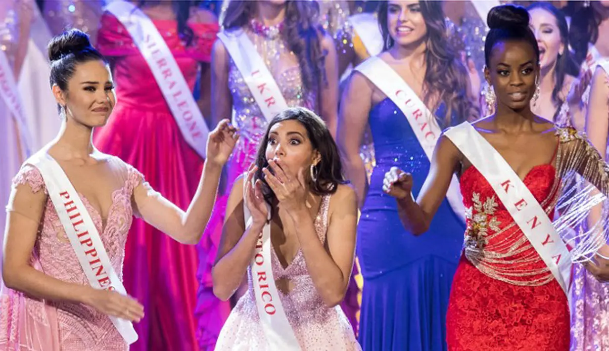 Menjadi seorang Miss World 2016 sepertinya menjadi hal yang mengejutkan bagi Stephanie, terlihat dari ekspresi wajahnya saat itu. Penyematan Tiara Biru dan selempang dilakukan oleh Mireia Lalaguna, Miss World 2015. (AFP/Bintang.com)