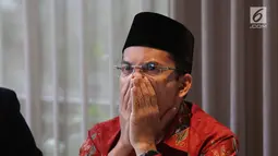 Ekspresi mantanGubernur NTB, Tuan Guru Bajang (TGB) Muhammad Zainul Majdi saat konferensi pers klarifikasi pemberitaan di Jakarta, Rabu (19/9). TGB diduga menerima aliran dana divestasi PT Newmont Nusa Tenggara periode 2009-2013. (Merdeka.com/Imam Buhori)