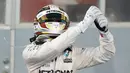 Ekspresi Lewis Hamilton setelah finis. (photo by AFP/FAYEZ NURELDINE)