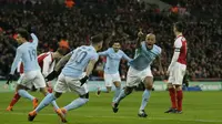 Manchester City sukses menjadi juara Piala Liga Inggris setelah menumbangkan Arsenal dengan skor 3-0 pada laga puncak, di Stadion Wembley, Senin (26/2/2018) dini hari WIB. (AP Photo/Tim Ireland)
