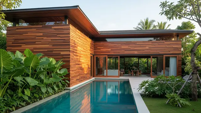 Rumah Minimalis Bentuk L Tampak Depan dengan Sentuhan Modern Tropis