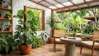 10 Ide Teras Rumah dengan Meja Semen dan Tanaman Monstera, Sudut Santai Paling Hits