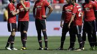 Para pemain Manchester United (MU) merayakan kemenangan atas Real Madrid lewat adu penalti pada ajang International Champions Cup 2017 di California, Amerika Serikat, Senin (24/7/2017). (AP Photo/Ben Margot)