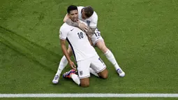 Pemain Inggris, Jude Bellingham, melakukan selebrasi setelah mencetak gol ke gawang Serbia pada laga Grup C Euro 2024 di Veltins Arena hari Senin (17/06/2024). (David Inderlied/dpa via AP)