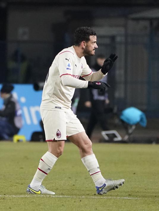Bek AC Milan, Alessandro Florenzi berselebrasi usai mencetak gol ke gawang Empoli pada pertandingan Liga Serie A Italia di Stadion Carlo Castellani di Empoli, Italia, Kamis (23/12/2021). Kemenangan ini membuat AC Milan berada di posisi kedua klasemen dengan 42 poin. (Marco Bucco/LaPresse via AP)