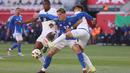 Lorenzo Pellegrini membuka kemenangan Italia lewat golnya di menit ke-3. (Charly TRIBALLEAU/AFP)