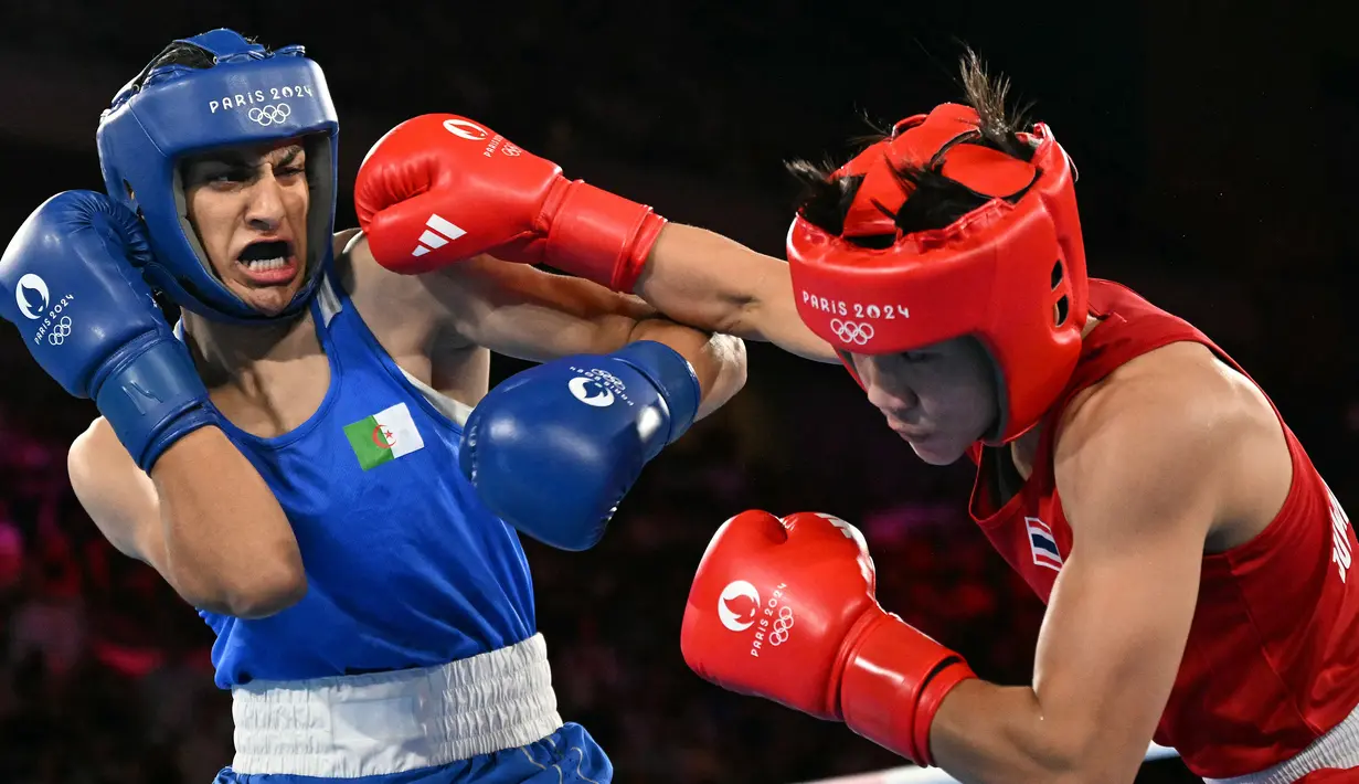 Imane Khelif yang menjadi sorotan karena masalah gendernya, selangkah lagi bisa meraih emas Olimpiade Paris 2024. (MOHD RASFAN / AFP)