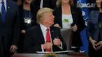 Donald Trump janji tingkatkan keamanan perbatasan dan imigran ilegal. Aktivis Greenpeace bentangkan spanduk penolakan di Gedung Putih.