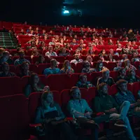 Ilustrasi menonton film di bioskop. (Photo by Krists Luhaers on Unsplash)