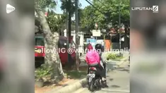Sebuah angkot sampai terobos trotoar saat dikejar petugas Dinas Perhubungan. Angkot tersebut kabur karena melanggar lalu lintas.