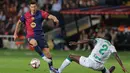 Kemenangan atas Getafe membuat Barcelona kian kokoh di puncak klasemen dengan raihan sempurna, 21 poin dari tujuh laga. (LLUIS GENE/AFP)