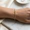 Model Gelang Emas Minimalis yang Cocok untuk Investasi Jangka Panjang (created by AI)