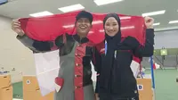Atlet menembak Indonesia, Fathur Gustavian dan Dewi Laila Mubarokah, yang sama-sama meraih medali emas di SEA Games 2021, di Hanoi, Vietnam. (NOC Indonesia)