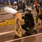 Para pendukung mantan Presiden Peru Pedro Castillo mengobarkan aksi protes yang diwarnai bentrokan pada 12 Desember 2022. (Dok. AFP)