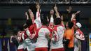 Pemain dan pelatih tim beregu putra Indonesia merayakan gelar juara cabang bulutangkis SEA Games 2019 di Multinlupa Sport Center, Rabu (4/12). Indonesia meraih emas setelah menang 3-1 atas Malaysia. (Bola.com/M Iqbal Ichsan)