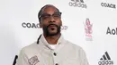 Rapper Snoop Lion menjadi mualaf di tahun 2009. Ia mengganti namanya Snoop Dog menjadi Snoop Lion karena ia tahu, hewan anjing sangatlah haram untuk kaum muslim. (AFP/Bintang.com)