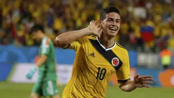 Selebrasi gelandang Kolombia James Rodriguez usai mencetak gol ke gawang Uruguay pada laga 16 Besar Piala Dunia 2014, Brasil, Sabtu (28/6/14). (REUTERS/Eric Gaillard)