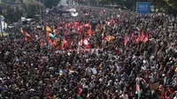 Para demonstran berkumpul dalam aksi pro-Palestina di Bologna, Italia, Jumat (3/10/2025). (Dok. Guido Calamosca/LaPresse via AP)
&nbsp;