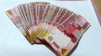 Uang pecahan Rp 100 ribu. (Foto: Liputan6.com/Muhamad Ridlo)