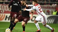 AC Milan kalah dari Olympiakos dengan skor 1-3. (AFP/Aris Messinis)