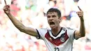 Thomas Mueller masuk dalam deretan pencetak gol terbanyak pekan pertama dengan tiga gol. Selain itu, Thomas Mueller juga tercatat sebagai pencetak hattrick pertama di Piala Dunia 2014, (19/6/2014). (REUTERS/Dylan Martinez) 