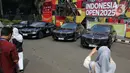 Belasan mobil listrik mewah ikut meramaikan gelaran Indonesia Open 2025 di Istora Gelora Bung Karno, Senayan, Jakarta, Selasa (3/6/2025). (Liputan6.com/Angga Yuniar)