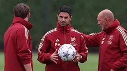 Arsenal akan menghadapi PSV Eindhoven di Stadion Emirates dalam pertandingan pembuka Grup B pada Kamis (21/9) dini hari WIB. (Adrian DENNIS / AFP)