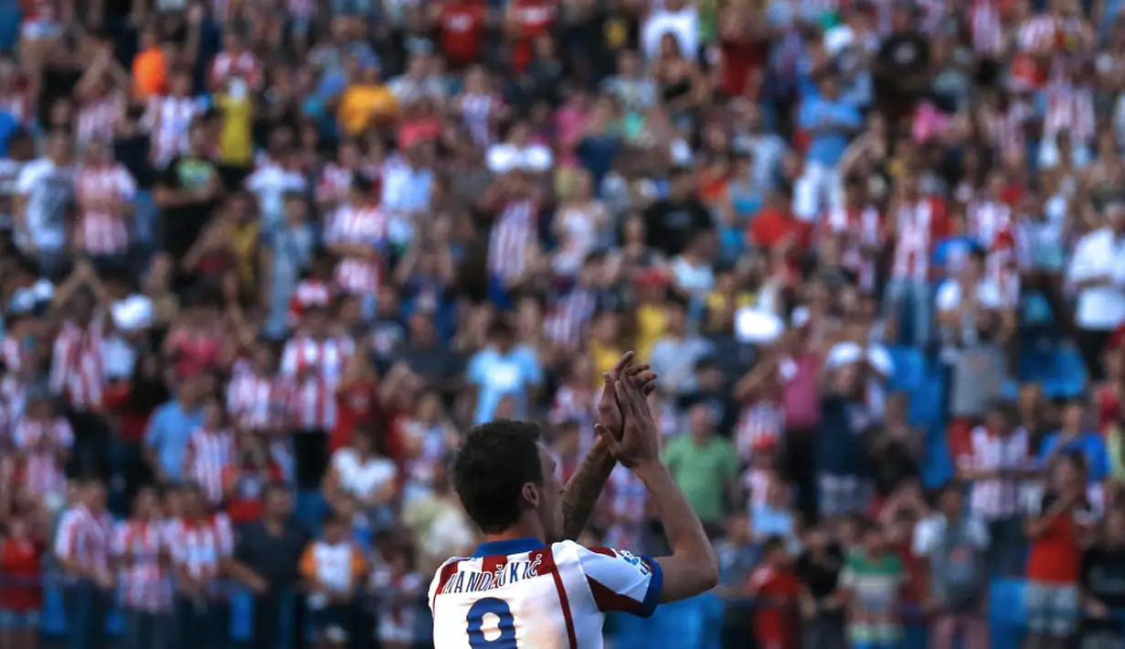 Di Atletico Madrid, Mario Mandzukic, akan menggunakan kostum bernomor 9, (24/7/2014). (REUTERS/Juan Medina)