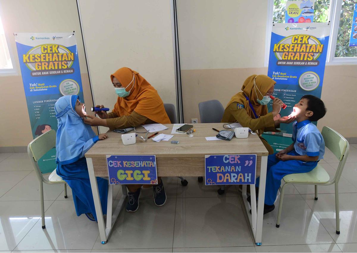 FOTO:  Antusias Murid SD Ikuti Cek Pemeriksaan Gratis di Sekolah