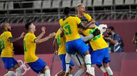 Timnas Brasil berhasil lolos ke final Olimpiade Tokyo 2020 setelah mengalahkan Meksiko dengan skor 4-1 lewat adu penalti di Kashima Stadium, Selasa (3/8/2021) sore WIB. (AP Photo/Andre Penner)
