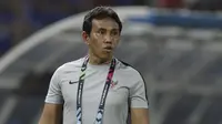 Pelatih Timnas Indonesia, Bima Sakti, memberikan arahan saat melawan Thailand pada laga Piala AFF 2018 di Stadion Rajamangala, Bangkok, Sabtu (17/11). Thailand menang 4-2 dari Indonesia. (Bola.com/M. Iqbal Ichsan)