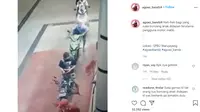 Dalam video yang dibagikan akun Instagram @agoez_bandz4, terlihat sebuah motor hendak mengisi Bahan Bakar Minyak (BBM) tak mematikan mesin saat menurunkan seorang anak dari bagian depan.