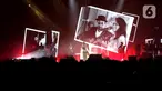 Penyanyi Yura Yunita saat tampil mengenang mendiang Glenn Fredly dalam pertunjukan Tutur
Batin Live in Concert 2023 di Tennis Indoor, Kompleks Gelora Bung Karno Jakarta, Jumat
(15/6/2023). Yura Yunita menyanyikan lagu berjudul Cinta dan Rahasia. (Liputan6.com/Helmi
Fithriansyah)