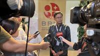 Kepala Pusat Riset Kecerdasan Artifisial dan Keamanan Siber Badan Riset dan Inovasi Nasional (BRIN) Anto Satriyo Nugroho saat acara Media Lounge Discussion dengan tema "Pengembangan dan Adopsi AI dalam Penanganan COVID-19" di Gedung B.J. Habibie, Jakarta pada Selasa, 23 Mei 2023. (Dok Liputan6.com/Fitri Haryanti Harsono)
