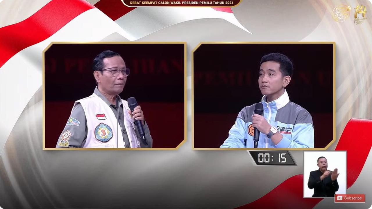 Calon Wakil Presiden (Cawapres) nomor urut 02 Gibran Rakabuming Raka dan Cawapres nomor urut 03 Mahfud Md saat tanya jawab di debat cawapres Pilpres 2024 yang digelar di JCC Senayan, Jakarta, Minggu (21/1/2024).