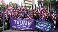 Demonstrasi digelar untuk berterima kasih kepada anggota parlemen dan presiden AS Donald Trump atas dukungannya pada Hong Kong. (AFP)