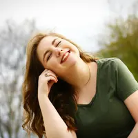 happy woman/copyright pexels/Matthias Cooper