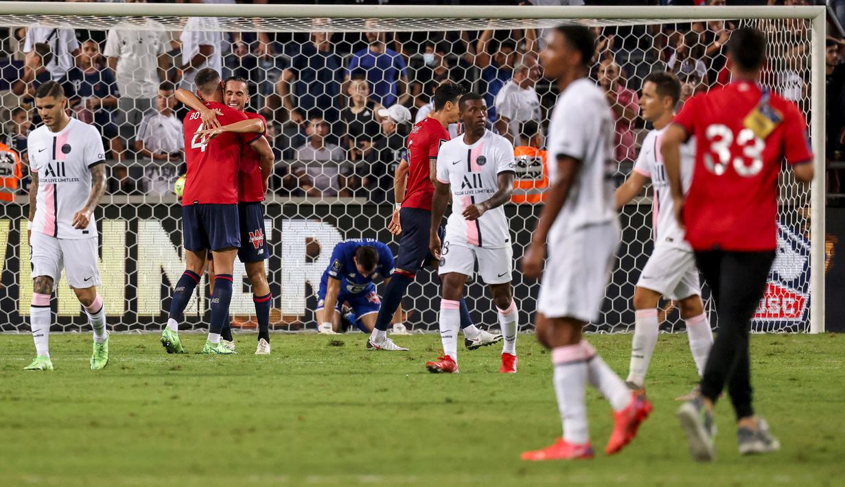Skor 1-0 akhirnya bertahan hingga laga selesai. Hasil tersebut membuat Lille mencetak sejarah baru dengan berhasil memenangkan gelar Trophée des Champions untuk pertama kalinya. Selain itu mereka juga sukses hentikan dominasi PSG selama tujuh tahun berturut-turut. (Foto: AFP/Emmanuel Dunand)