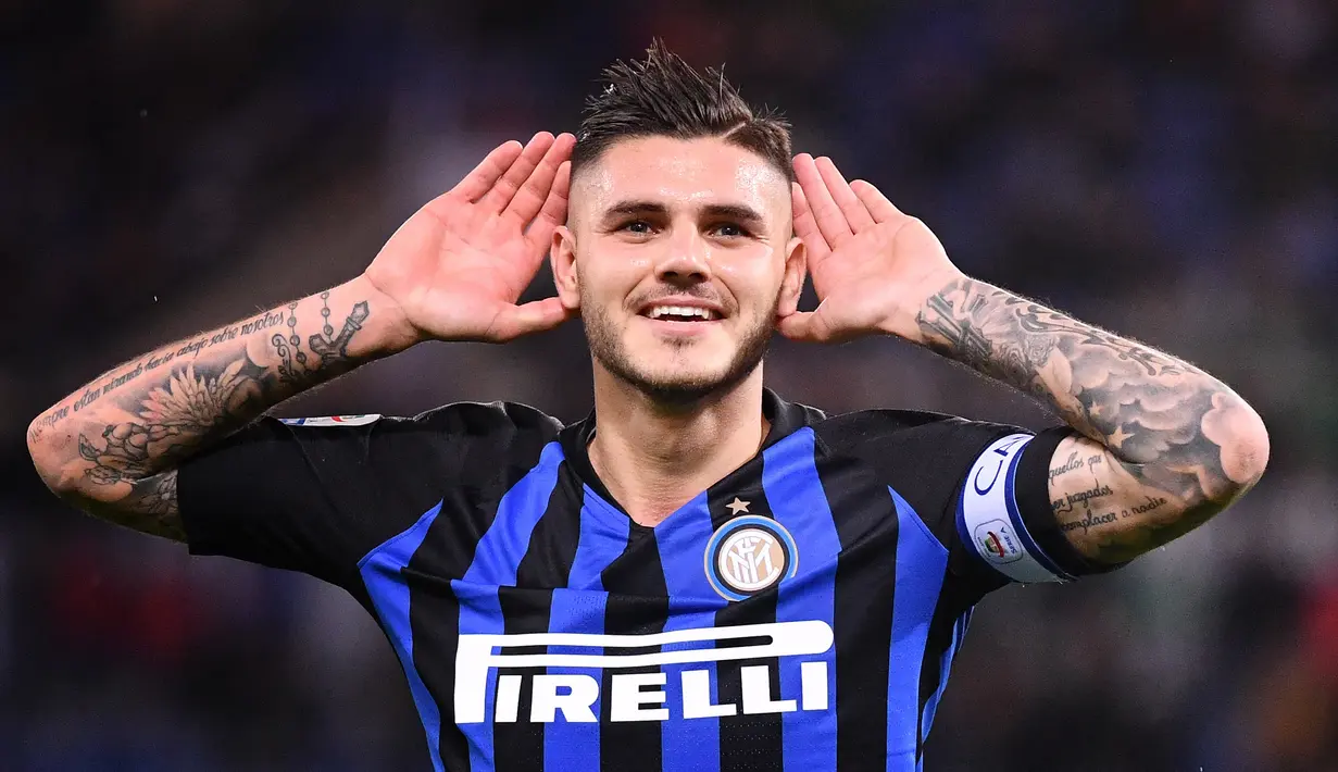 Mauro Icardi. Striker Argentina berusia 29 tahun yang kini memasuki musim ke-2 bersama PSG ini menjadi top skor Inter Milan di 5 musim berurutan Liga Italia, mulai 2014/2015 hingga 2018/2019. Rinciannya adalah 22, 16, 24, 29 dan 11 gol dalam 5 musim tersebut. (AFP/Alberto Pizzoli)